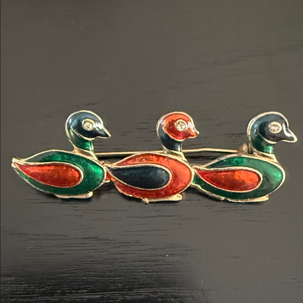 vintage enamel duck brooch featuring three mallard ducks